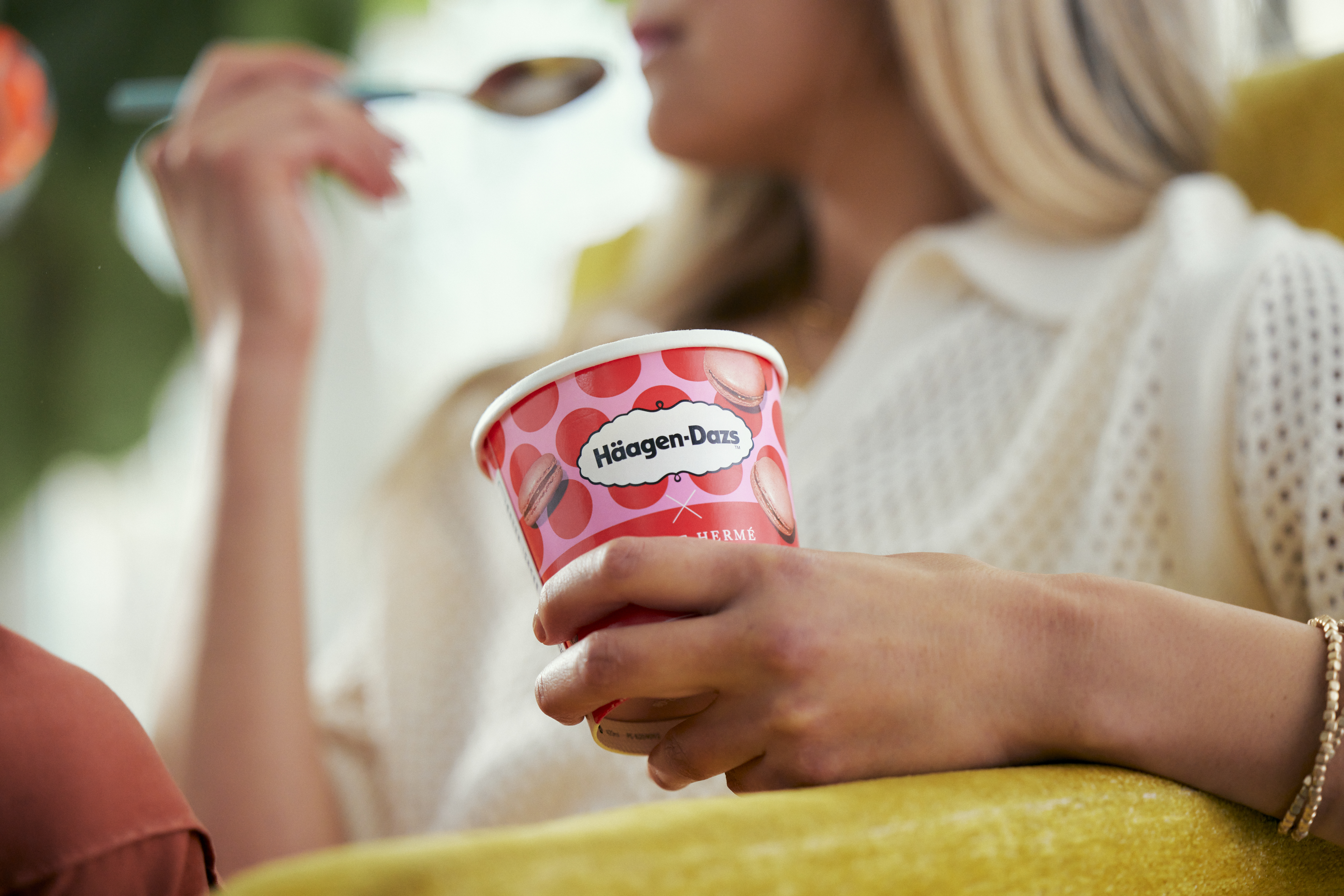 Woman eating Haagen-Dazs ice cream